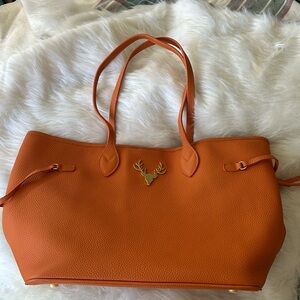 Taxidermy orange pebble leather shoulder tote